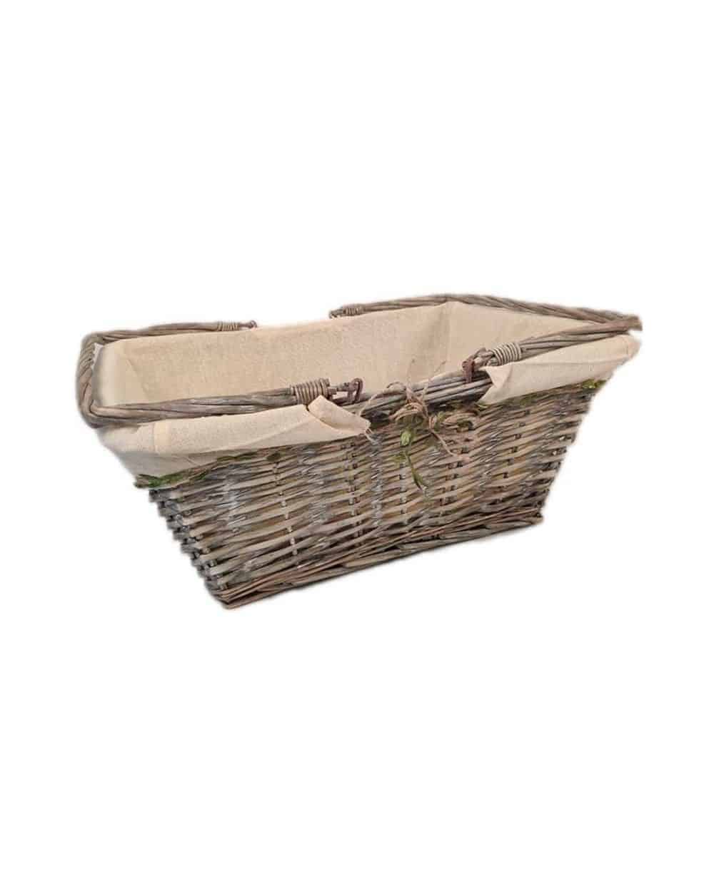 Panier en osier tissus beige et liseré feuilles anses rabattables